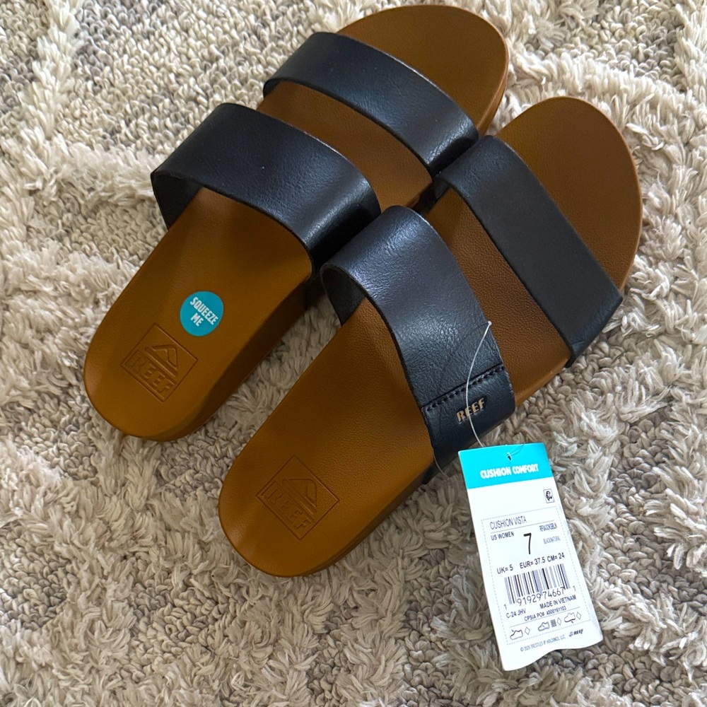 Reef Black and Tan Slide Sandals